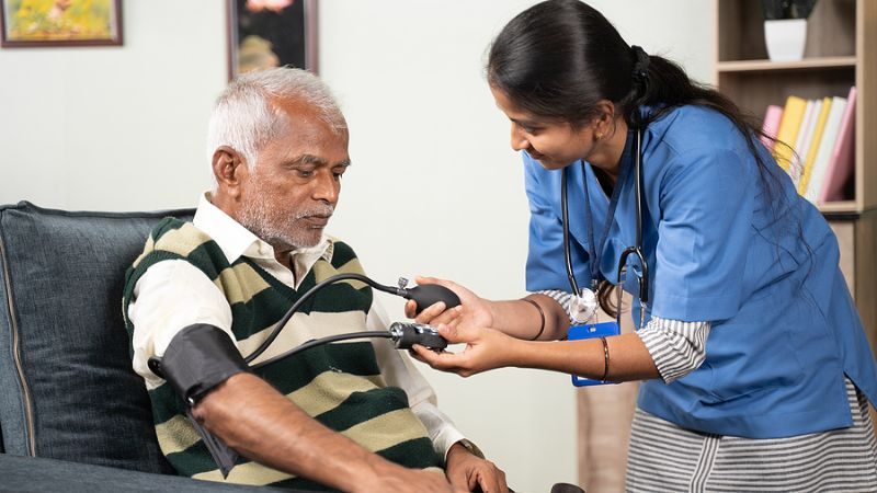 An in-home hospice nurse tracks a patient's symptoms